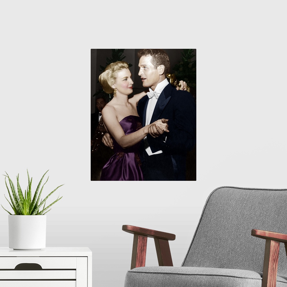 A modern room featuring Joanne Woodward dances with husband Paul Newman
