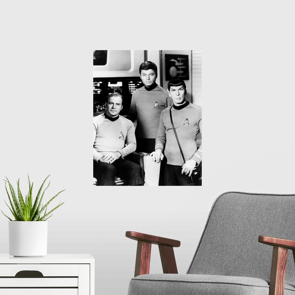 A modern room featuring Black and white photograph of William Shatner,  DeForest Kelley, Leonard Nimoy.
