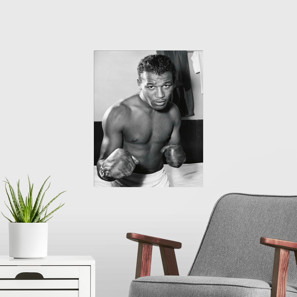 A modern room featuring Sugar Ray Robinson was the welterweight boxing champion from 1946-1950.