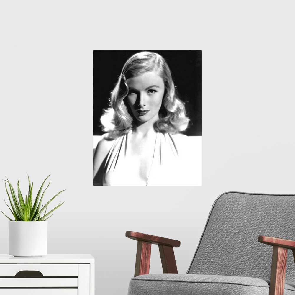 A modern room featuring Vintage black and white photograph of actress Veronica Lake.