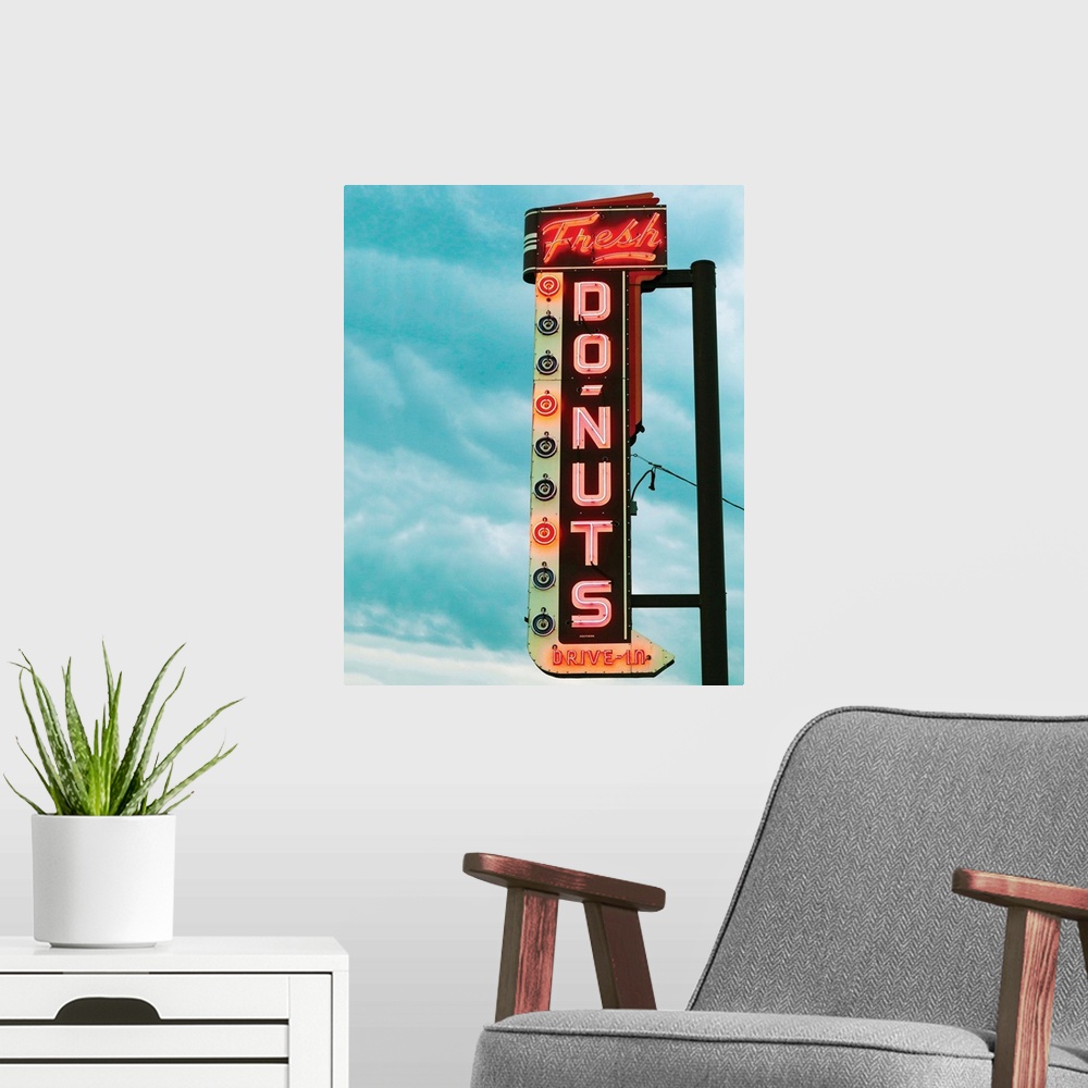A modern room featuring Photograph of a vintage 'Fresh Doughnut' neon sign with a cloudy blue sky in the background.