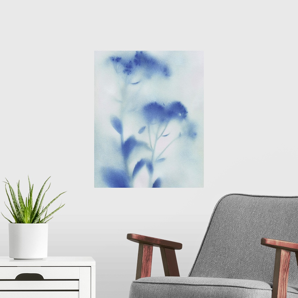 A modern room featuring Abstract painting of wildflowers with a misty look in blue and white.