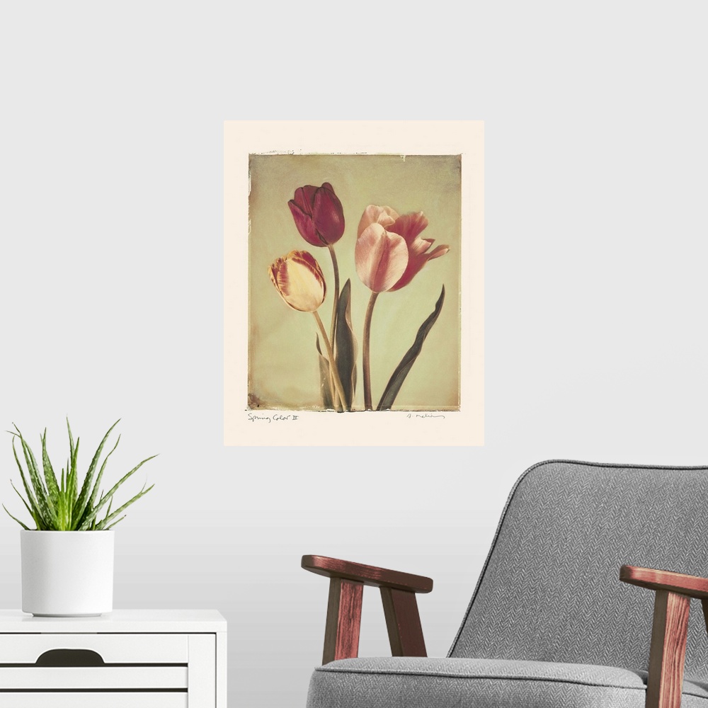 A modern room featuring Painting of three tulips.