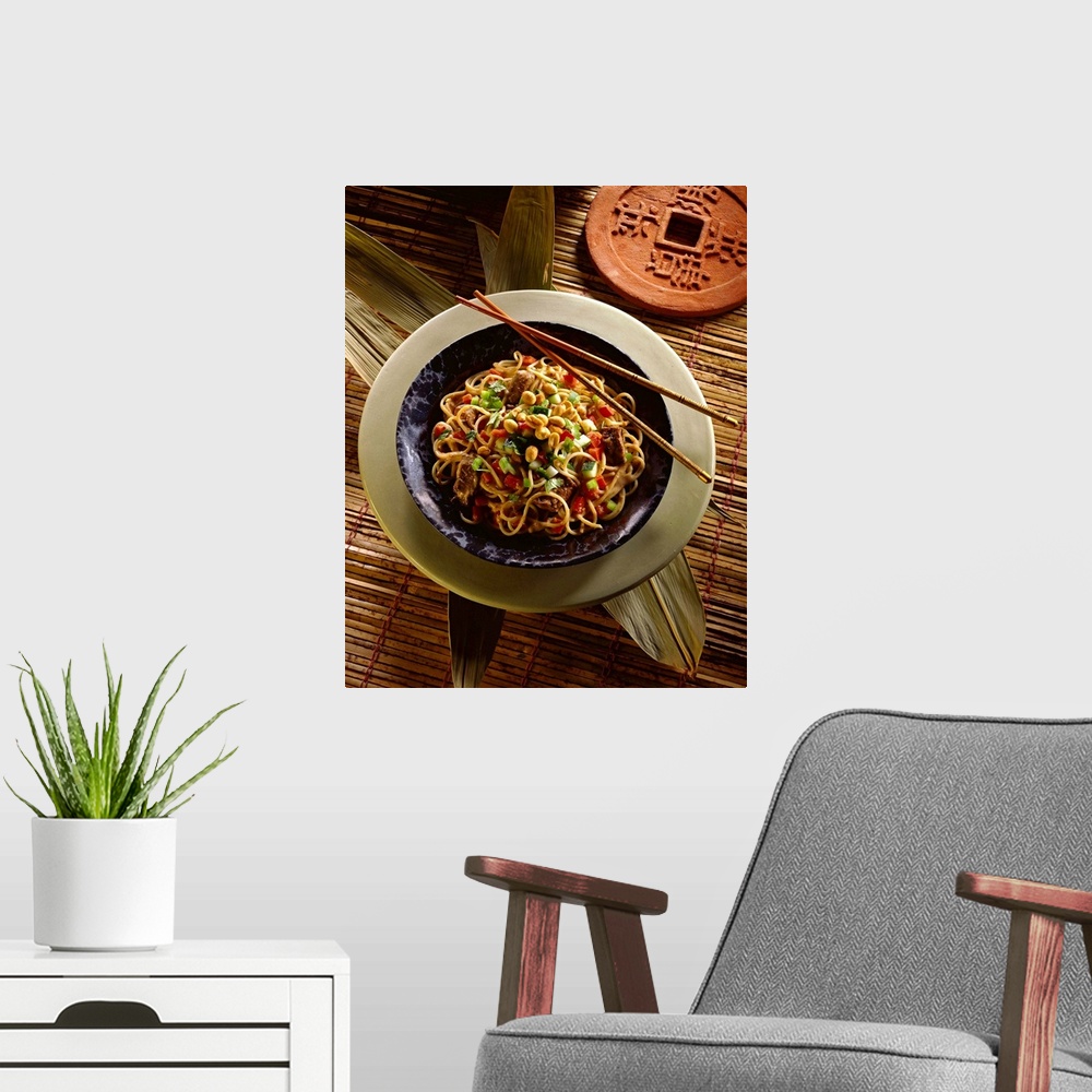 A modern room featuring Asian noodles with beef and peanuts