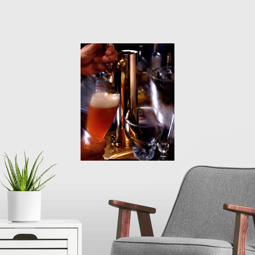 A modern room featuring Beer being poured from tap