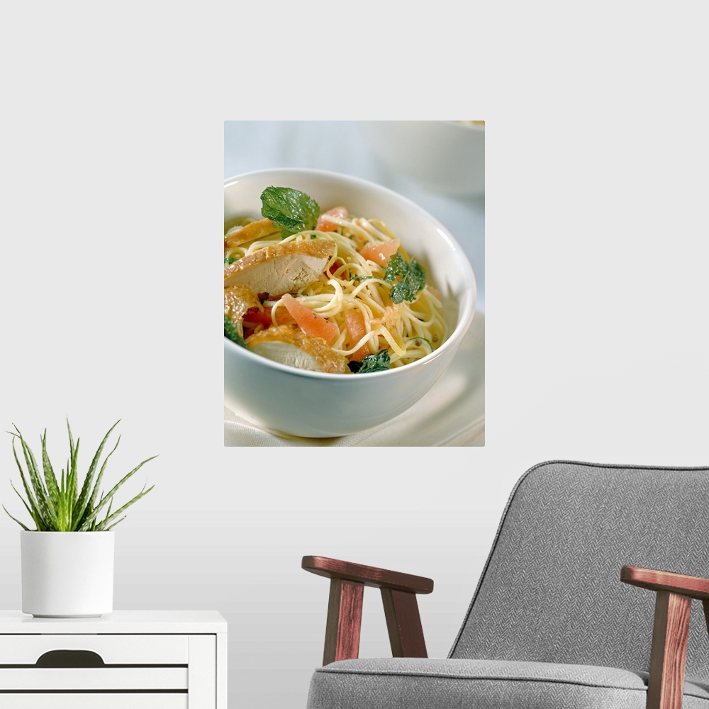 A modern room featuring Chicken pasta in bowl, close-up