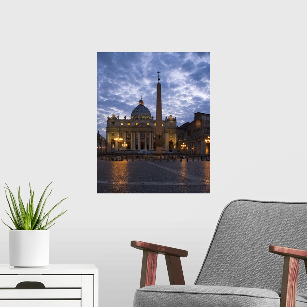 A modern room featuring Italy, Rome, Vatican City, St. Peter's Basilica illuminated at dusk