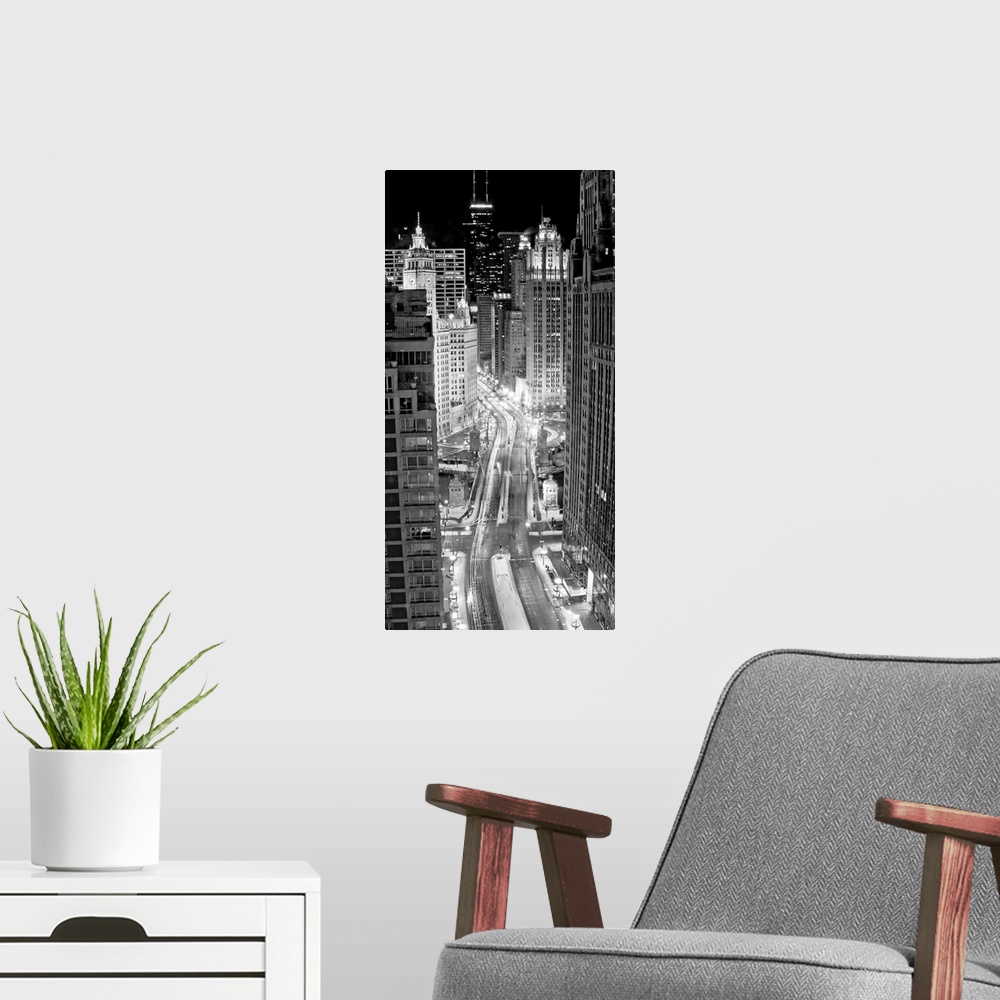 A modern room featuring Panoramic monochromatic photographic from an aerial view looking through the downtown streets of ...