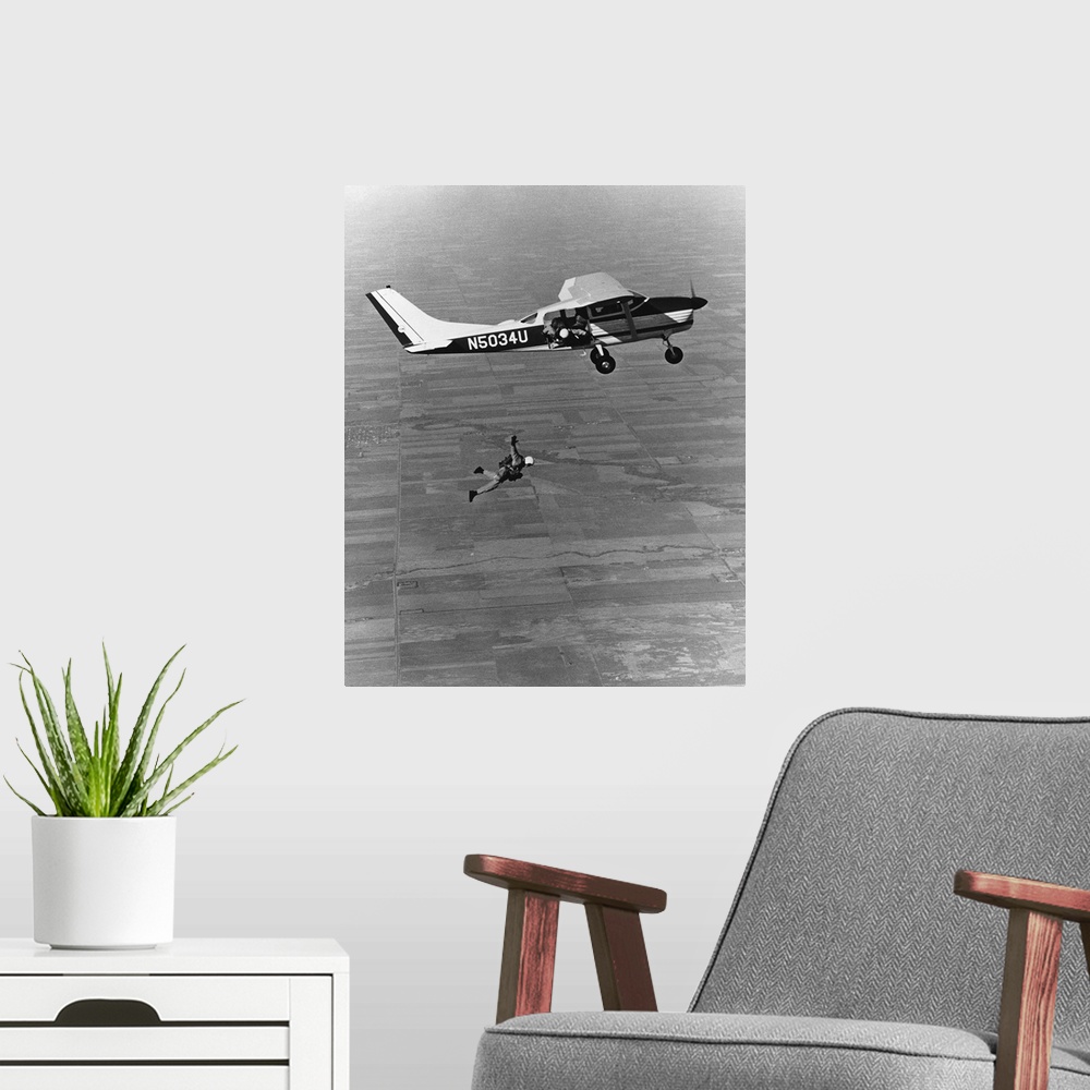 A modern room featuring Skydiver jumping out of plane