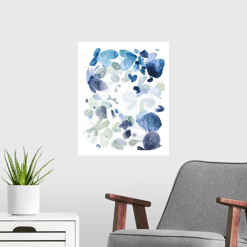 A modern room featuring Watercolor painting of in shades of blue on white.
