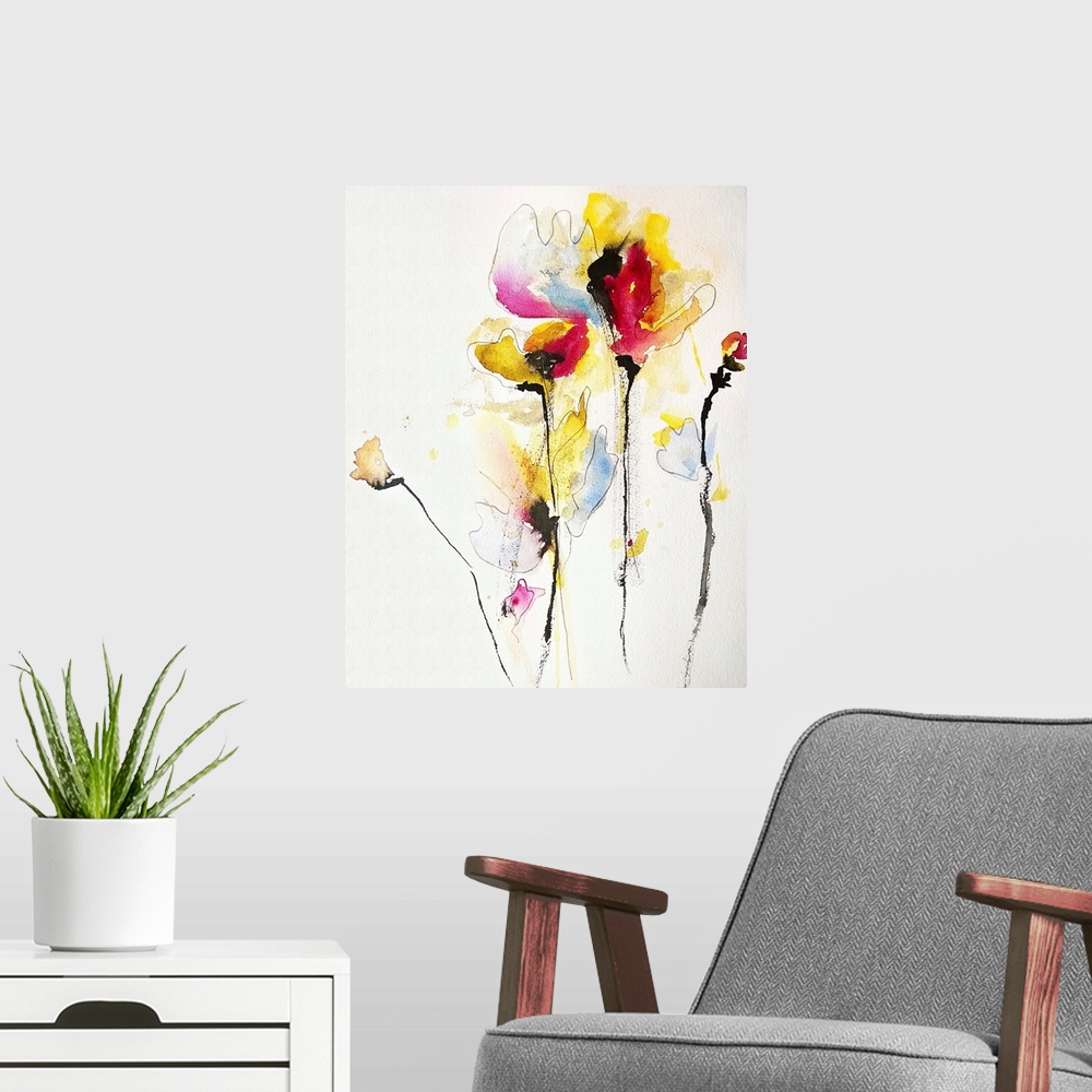 A modern room featuring Contemporary watercolor painting of vibrant colored yellow and red flowers.