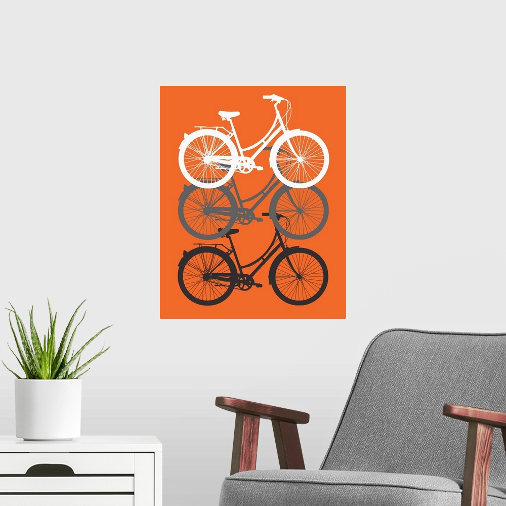 A modern room featuring Three Bikes on Orange