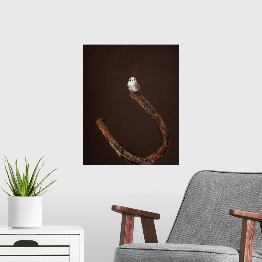 A modern room featuring Painting of a small bird perched on the end of a horseshoe.
