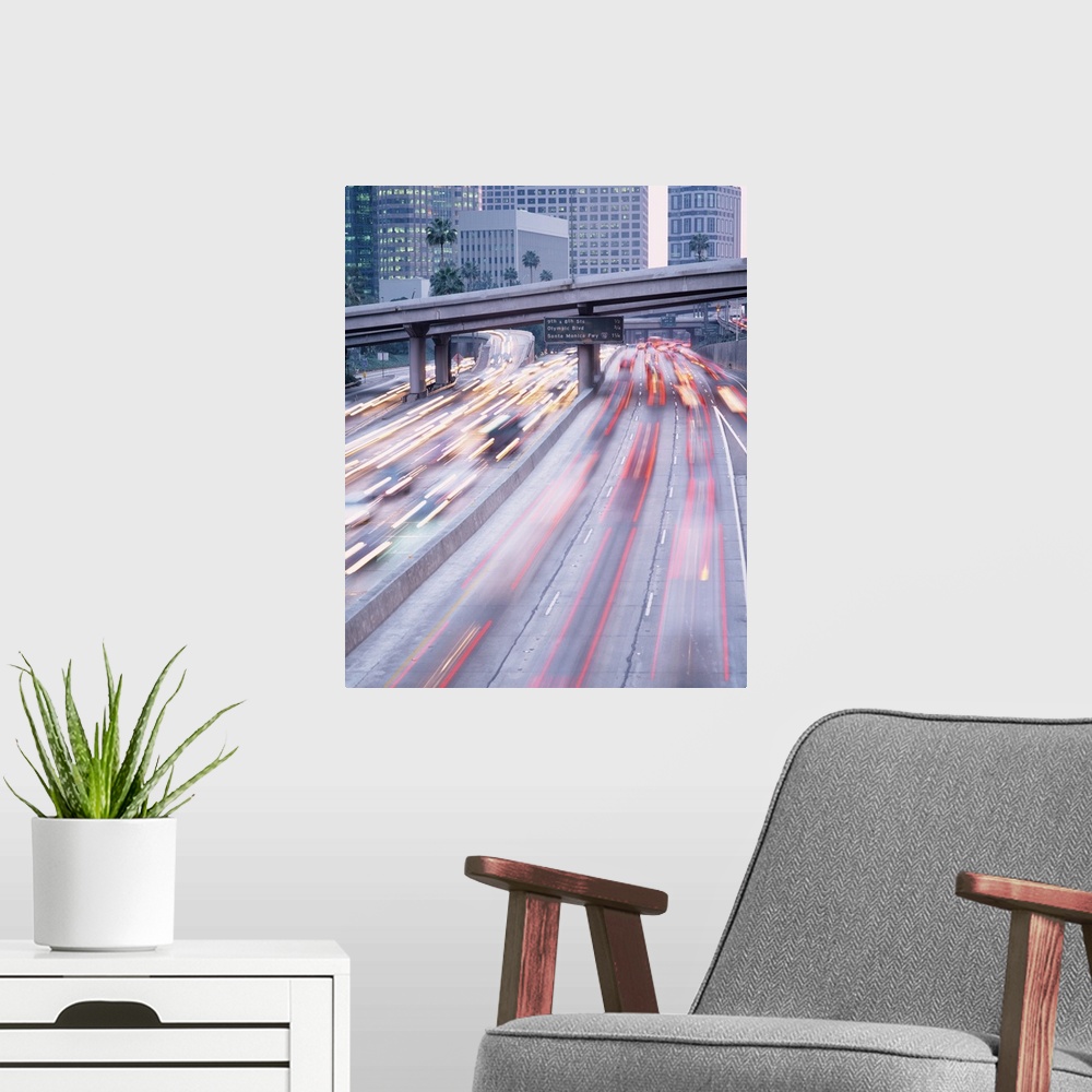 A modern room featuring Streaks of lights are photographed as traffic in Los Angeles moves quickly in either direction do...