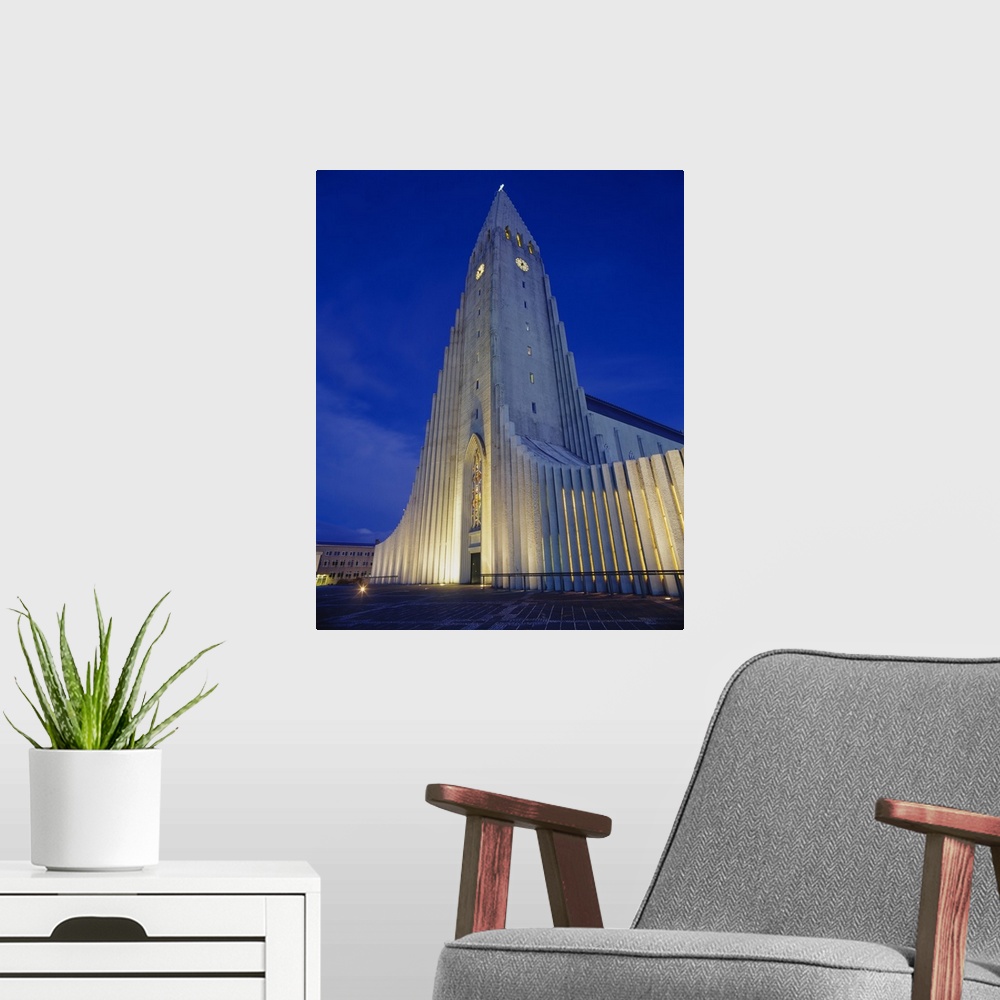A modern room featuring Facade of a church at dusk, Hallgrimskirkja, Reykjavik, Iceland