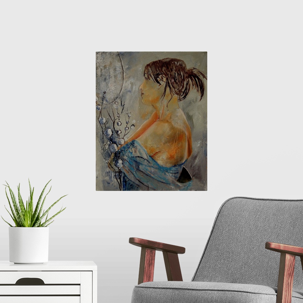 A modern room featuring A nude painting of the profile of a woman in textured neutral colors.