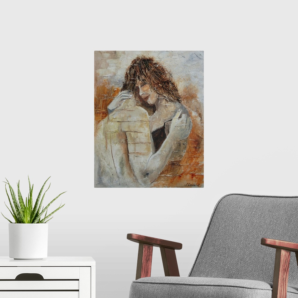 A modern room featuring A portrait of a couple embracing done in textured, neutral colors.