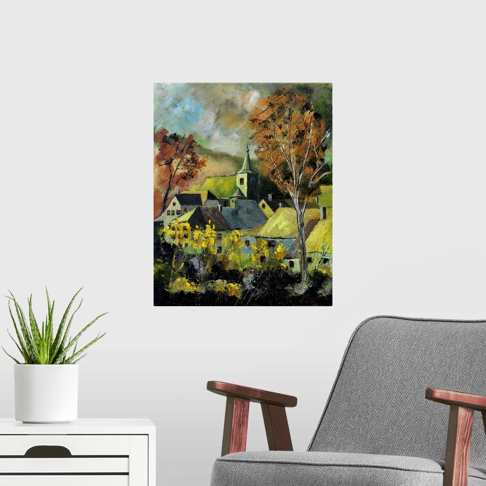 A modern room featuring Vertical painting of a darkened landscape with trees in the foreground and a Belgium village in t...