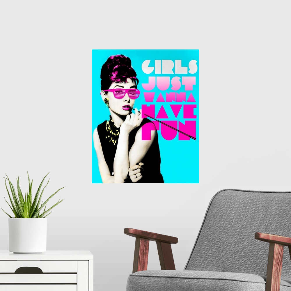 A modern room featuring Wall art of Audrey Hepburn wearing sunglasses with the text, ""Girl's just wanna have fun"".