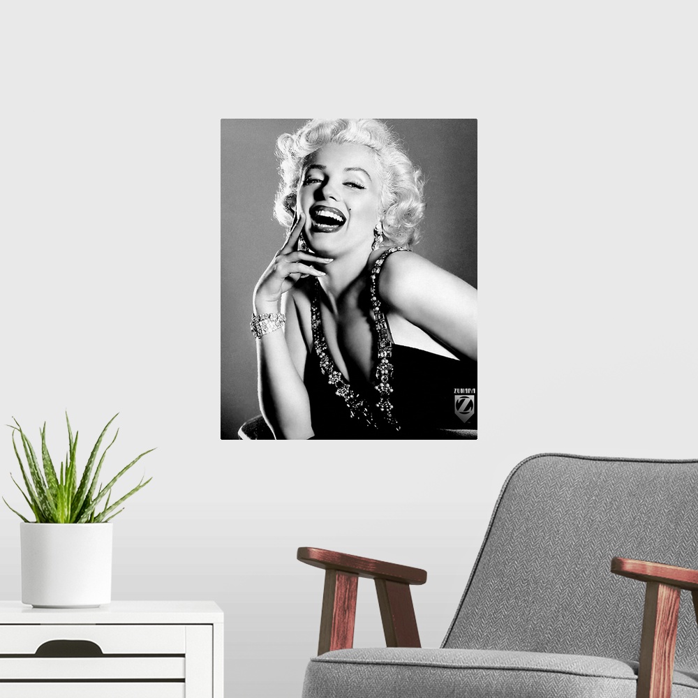 A modern room featuring Portrait photograph of American actress, model, singer, and sex symbol Norma Jeane Mortenson.