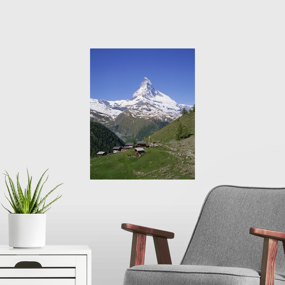 A modern room featuring Chalets and restaurants below the Matterhorn in Switzerland