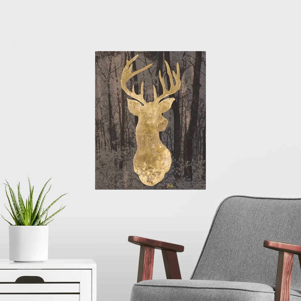 A modern room featuring Metallic gold silhouette of a deer on a dark background filled with trees.