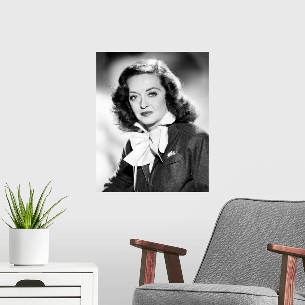 A modern room featuring American actress. Photographed in the role of Margo Channing in 'All About Eve,' 1950.