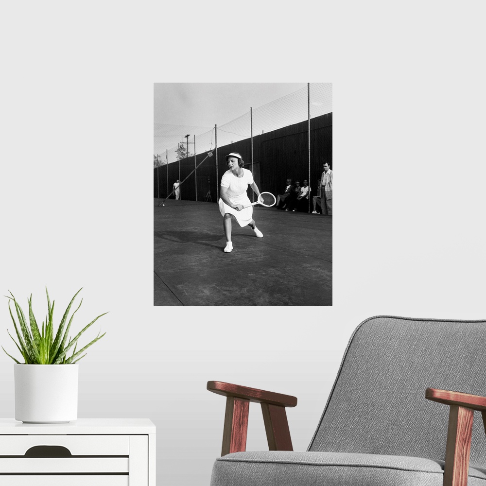 A modern room featuring (1906-1998). American tennis player. Photograph, 1945.