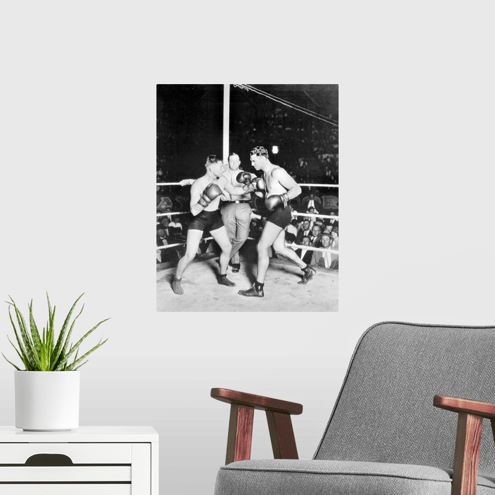 A modern room featuring American boxer. The Dempsey-Newman fight, 1925.
