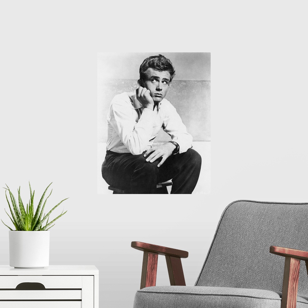 A modern room featuring American cinema actor. Photographed 1955.