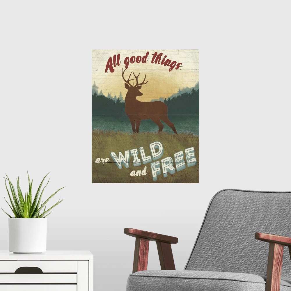 A modern room featuring "All good things are wild and free" over a minimalist image of a deer in the wilderness.