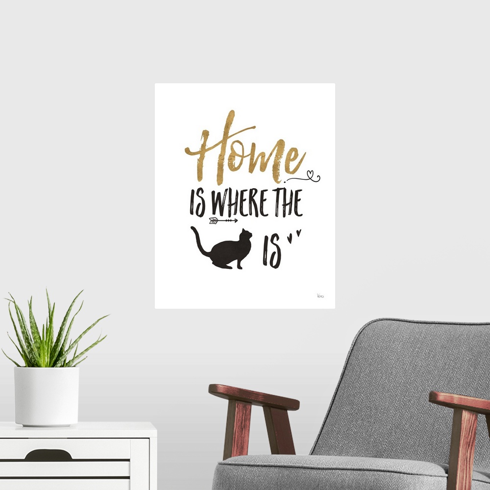 A modern room featuring "Home is Where the (cat) is" in black and gold.