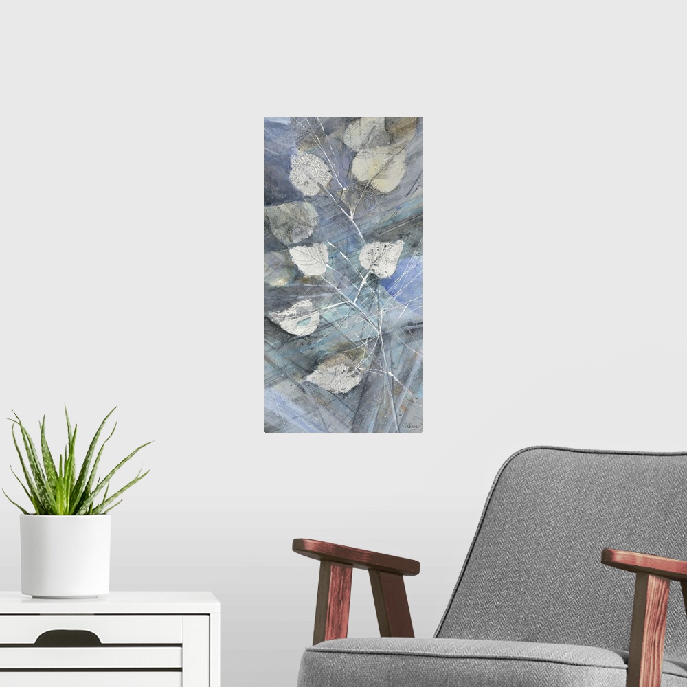 A modern room featuring Contemporary artwork of silver leaves against a blue toned background.