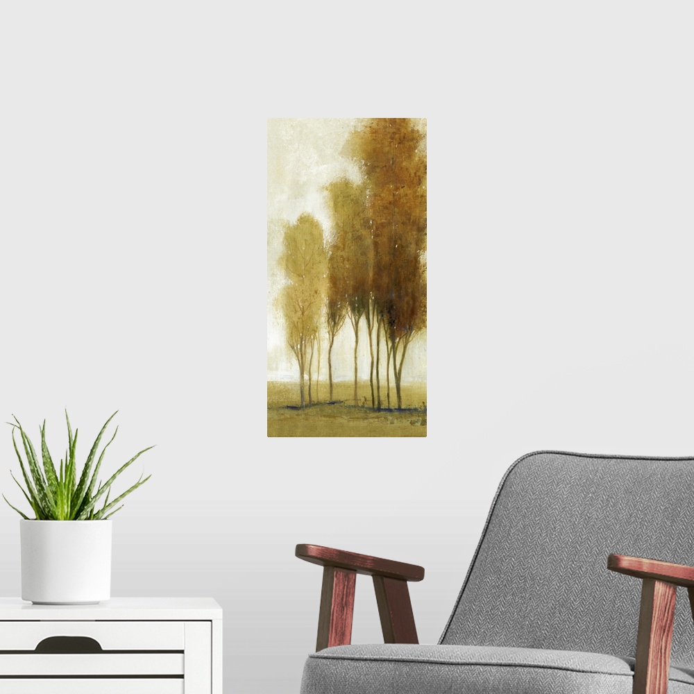A modern room featuring Golden trees in autumn foliage in a countryside scene.