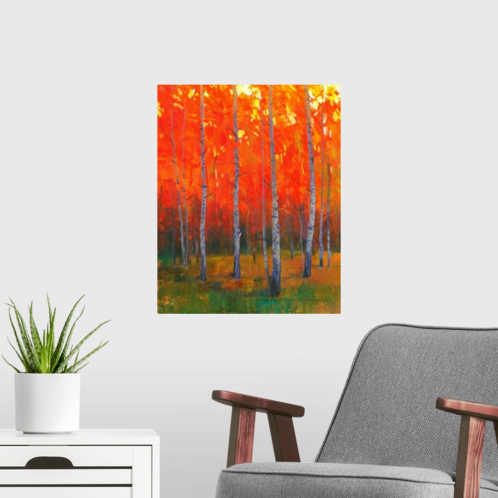 A modern room featuring Contemporary painting of a forest of thin trees with leaves glowing in the sunset light in the fall.