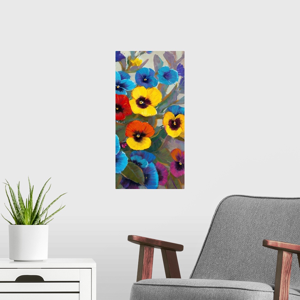 A modern room featuring A flower bed of colorful pansies on a vertical panel.