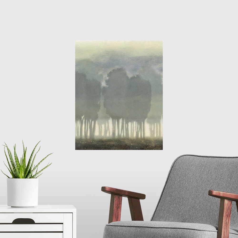 A modern room featuring Artwork of silhouetted trees in a foggy landscape.