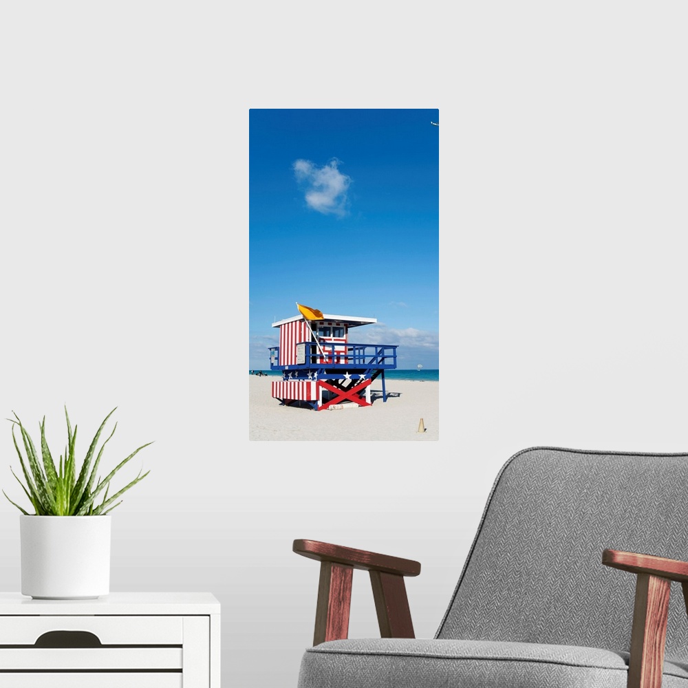 A modern room featuring United States, USA, Florida, Miami Beach, A plane and a cloud over an American beach hut