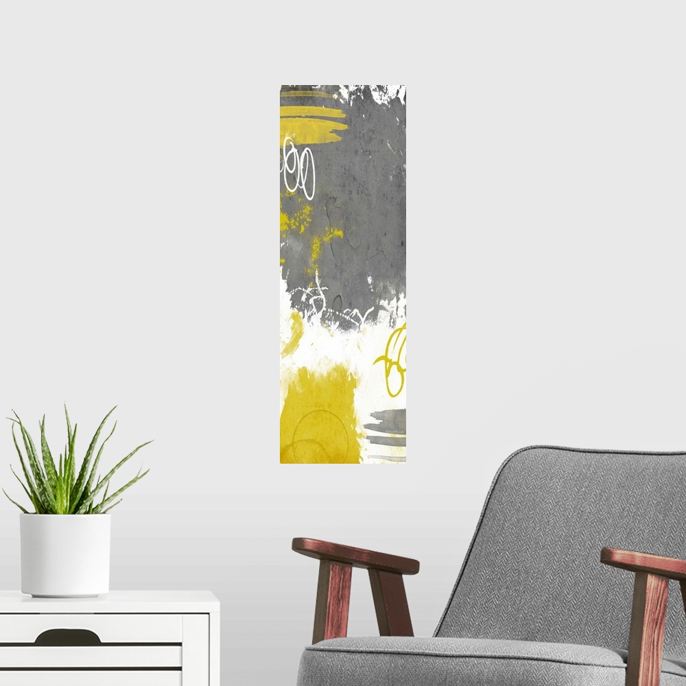 A modern room featuring Vertical contemporary abstract art in shades of white, grey, and yellow.