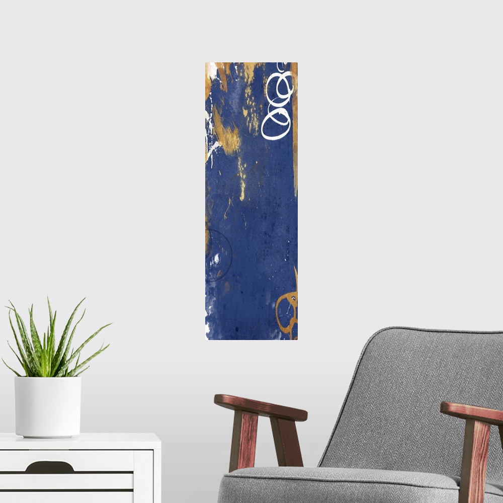 A modern room featuring Vertical contemporary abstract art in shades of gold and navy.