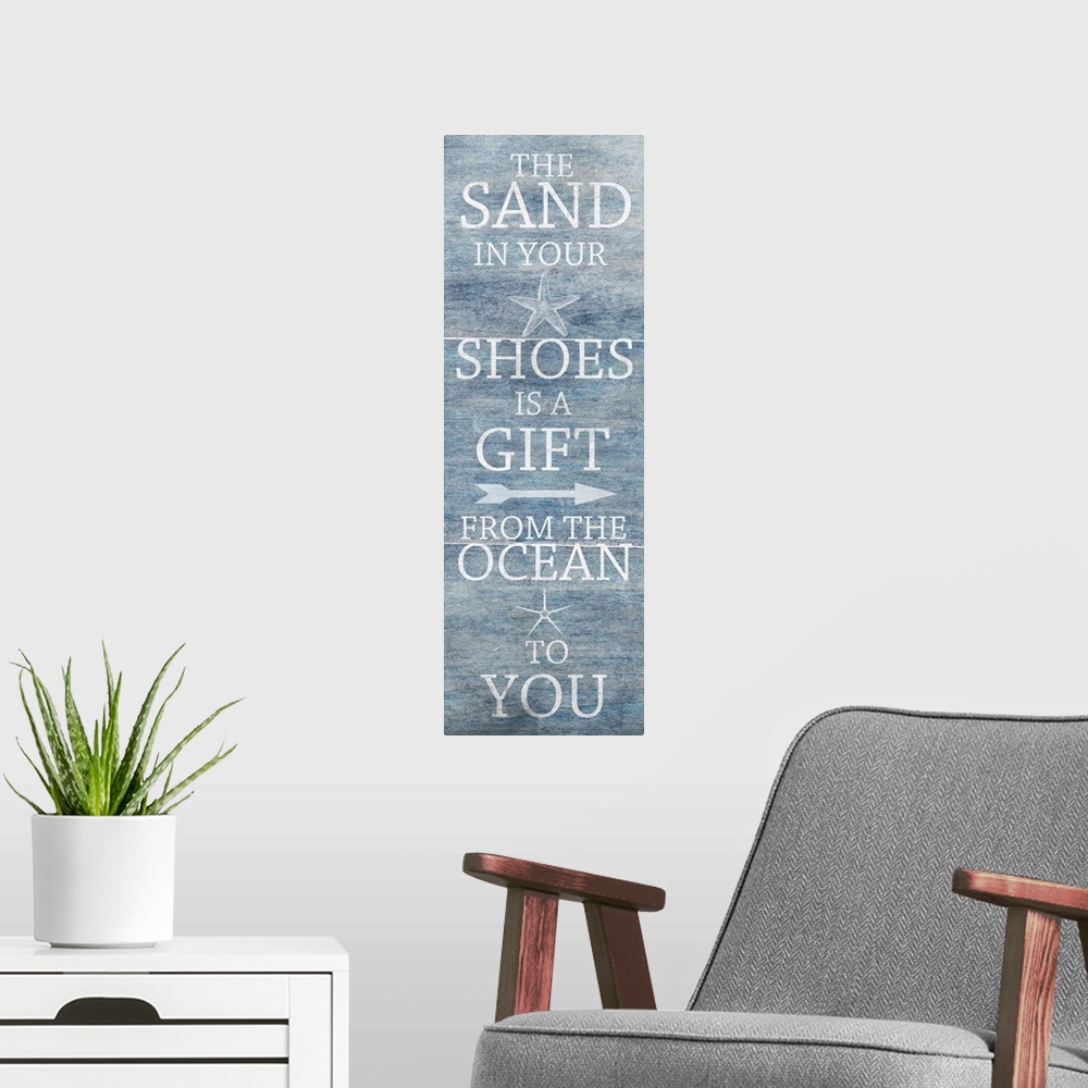 A modern room featuring "The sand in your shoes is a gift from the ocean to you"