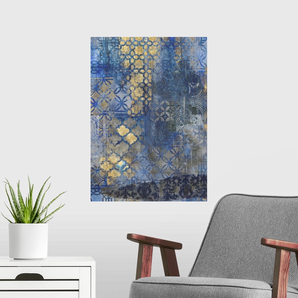 A modern room featuring Contemporary pattern home decor artwork of gold ornate patterns against a dark blue background.