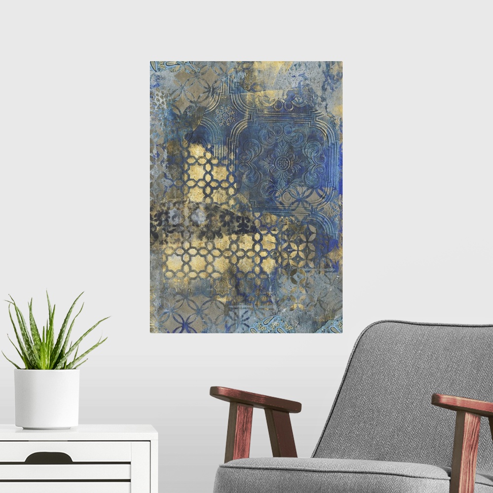 A modern room featuring Contemporary pattern home decor artwork of gold ornate patterns against a dark blue background.