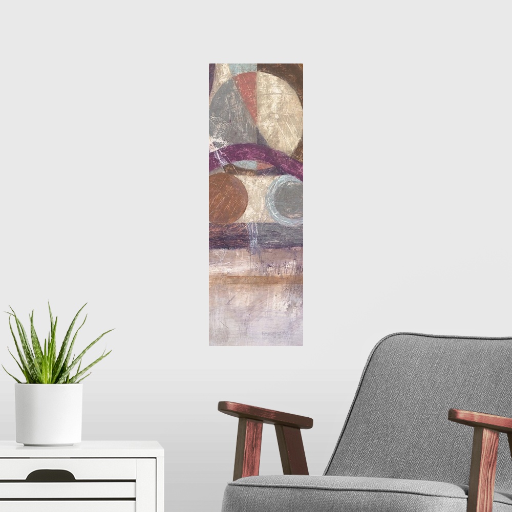 A modern room featuring Vertical abstract artwork with circular geometric shapes in browns and purples.