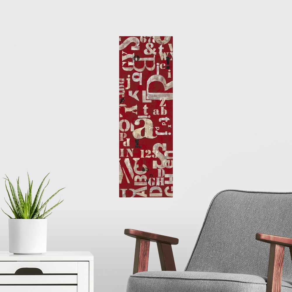 A modern room featuring Contemporary home decor artwork using letters against a deep red background.