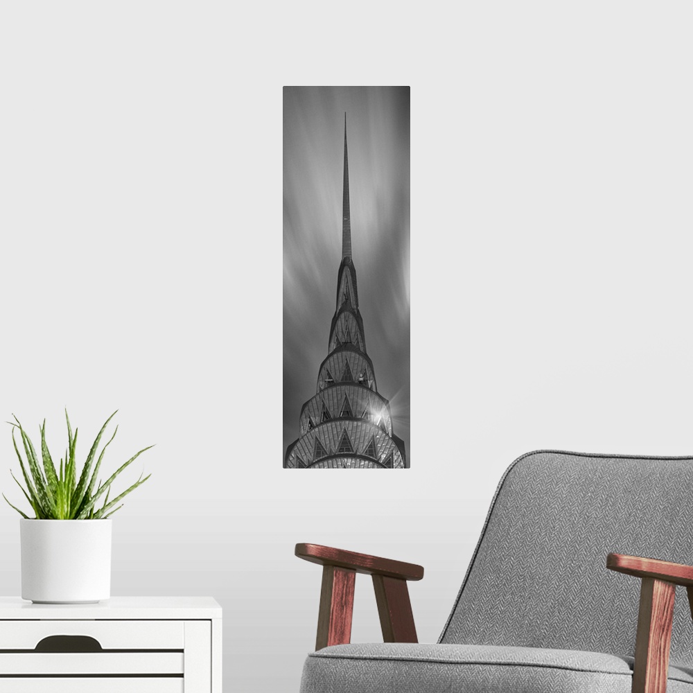 A modern room featuring A photograph of the Chrysler building taken in black and white.
