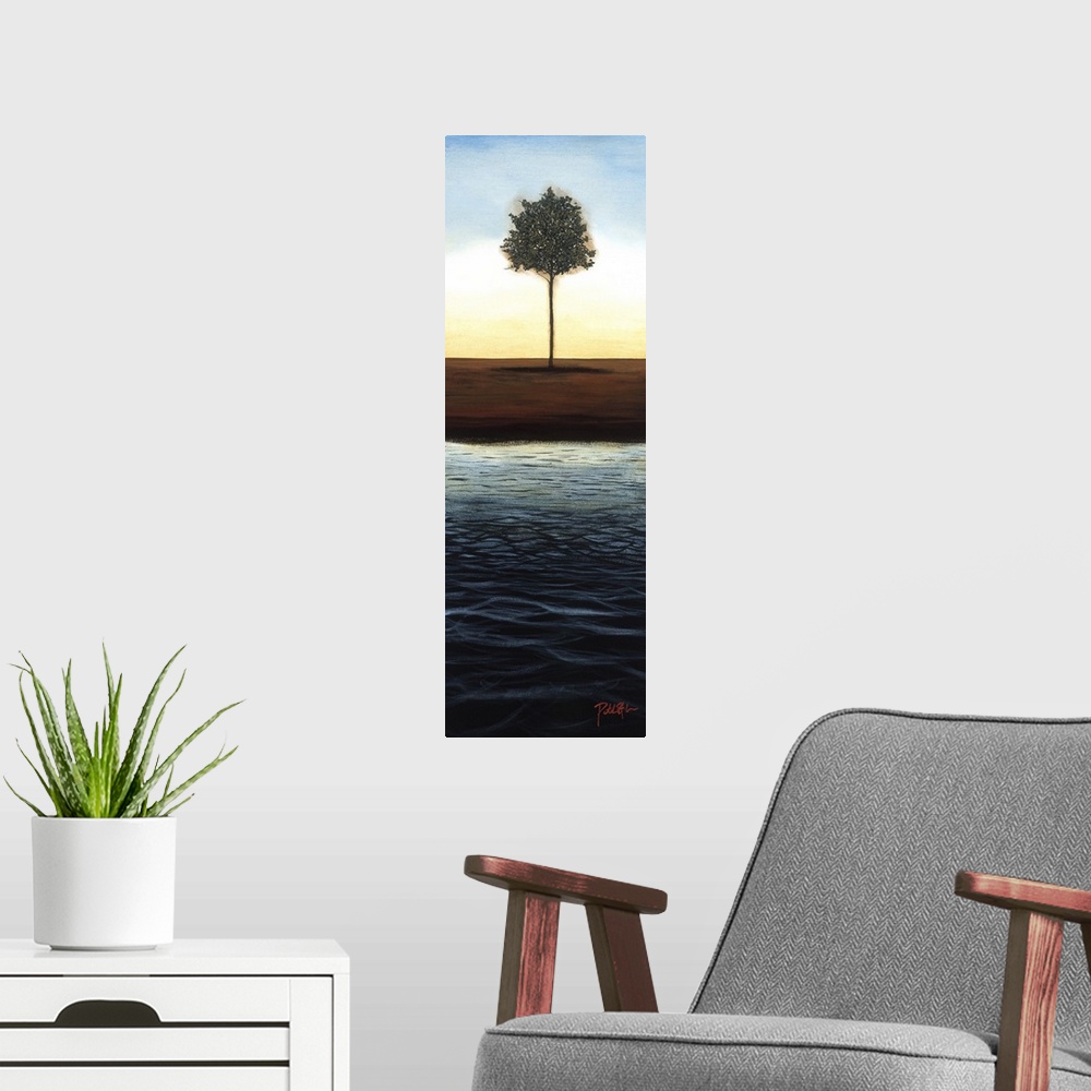 A modern room featuring A long vertical painting of a single tree next to a body of water with the sun setting behind it.