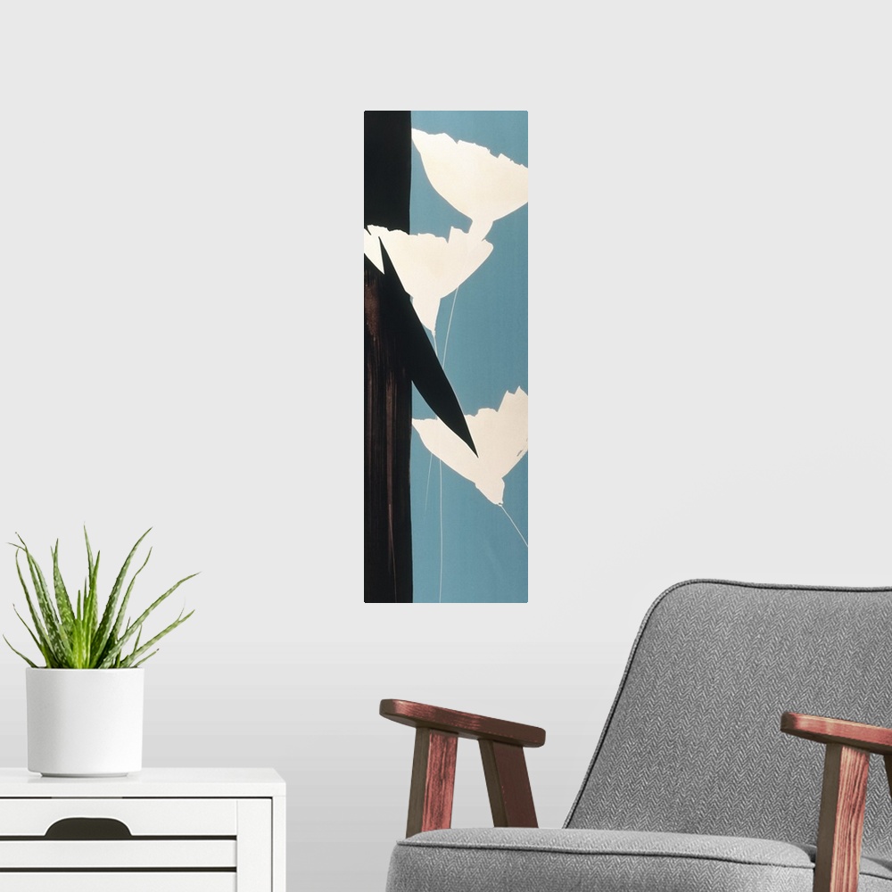 A modern room featuring A long vertical painting in a modern design of flowers on a blue backdrop.