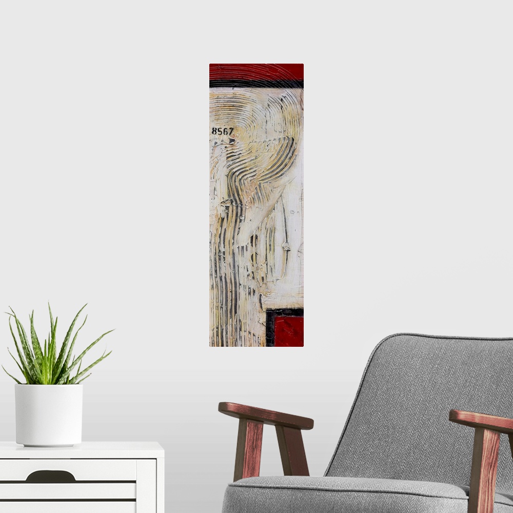 A modern room featuring Contemporary abstract artwork in red and white with narrow stripes.