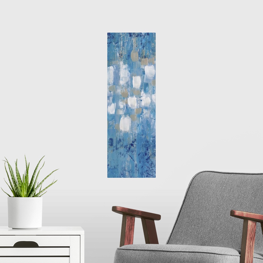 A modern room featuring Contemporary abstract painting in blue with white and grey shapes in the center.